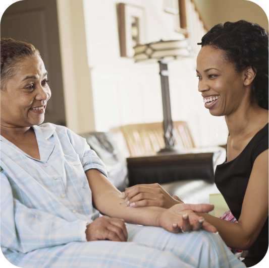 caregiver helps her patient