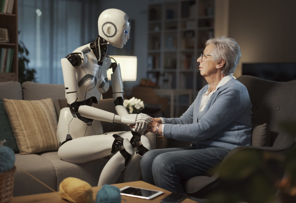 A home care robot gently holding hands with an elderly woman, showing emotional connection and AI assistance in senior care.